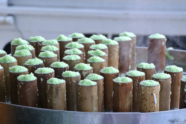 Putu bamboo being cooked. Malaysian desert mainly made from coconut and glutinous rice