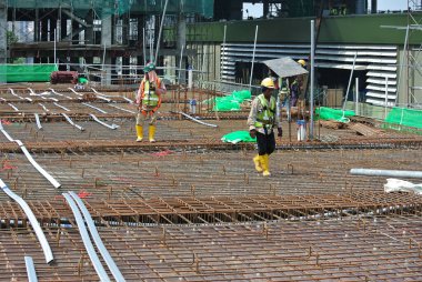 PERAK, MALAYSIA -APRIL 12, 2016: Floor slab reinforcement bar with post tension cable tendon on timber form work at the construction site in Perak, Malaysia