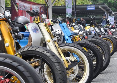NEGERI SEMBILAN, MALAYSIA -MAY 21, 2016: Custom Street cub motorcycle parked in public areas. Motorcycles was modified by the owner with his creativity.