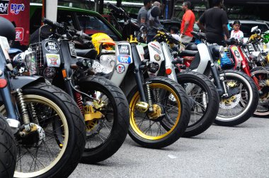 NEGERI SEMBILAN, MALAYSIA -MAY 21, 2016: Custom Street cub motorcycle parked in public areas. Motorcycles was modified by the owner with his creativity.