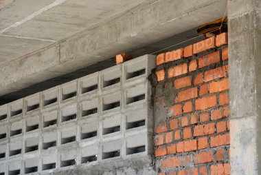 MELAKA, MALAYSIA -APRIL 08, 2016: Clay brick arranged to form brick wall. 