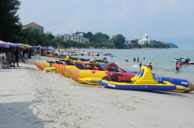 PORT DICKSON, MALAYSIA -MAY 08, 2016: Banana boat for rent at Port Dickson Beach in Malaysia. Port Dickson is one of the famous tourist spot in Malaysia.   