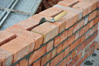 Clay brick arranged to form brick wall. 