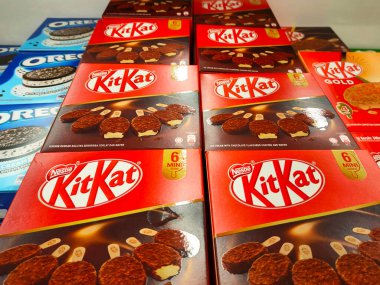 JOHOR, MALAYSIA - MARCH 5, 2022: Ice cream sticks packed in bulk in boxes and stored in the freezer. Displayed for sale in supermarkets. Has a price tag.