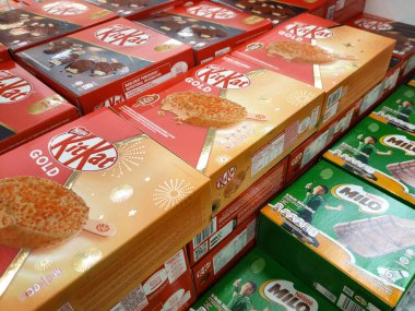 JOHOR, MALAYSIA - MARCH 5, 2022: Ice cream sticks packed in bulk in boxes and stored in the freezer. Displayed for sale in supermarkets. Has a price tag.