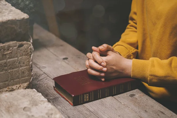 Woman Praying Holy Bible Morning Holding Hands Prayer Wooden Table — стоковое фото