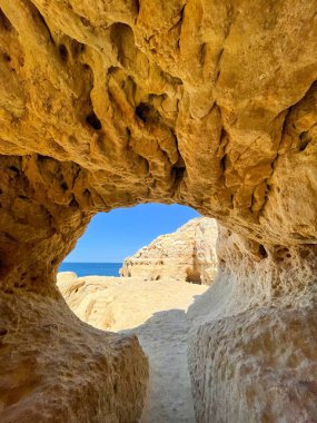 Rock and caves at Boneca beach Algarve Portugal. High quality photo