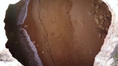 Flying inside the famous Benagil cave in Algarve portugal. High quality 4k footage