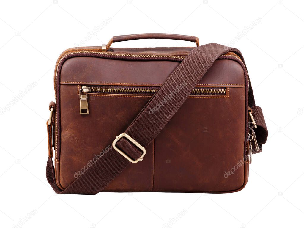 Colorful leather brown handbag with the long handle placed on white background