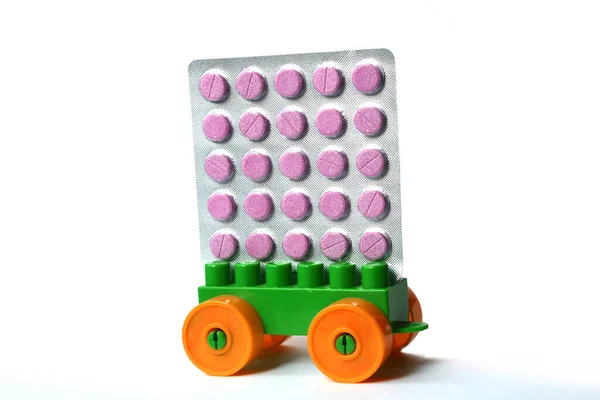 Makupy Děti Hračka Zelené Auto Farmaceutickou Pilulku Vzhůru Nohama Dodávka — Stock fotografie