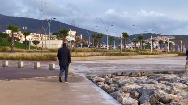 Adult Man Walking Morning Nearby Coast — Vídeos de Stock