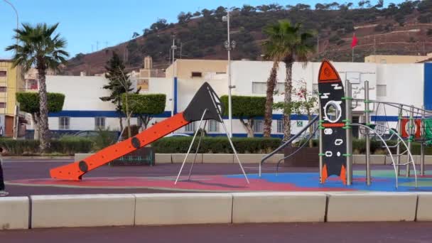 Man Walking Empty Kids Playground Early Morning — Stock Video