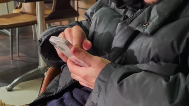 Unrecognizable Man Holding His Smartphone — Stok Video