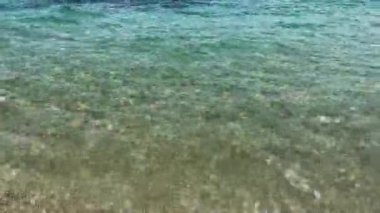 Transparent sea water on the shoreline