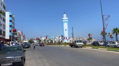 Cars driving on the road nearby the Mohamed V mosque in Fnideq