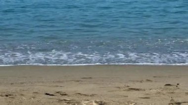Mediterranean Sea waves hitting the beach