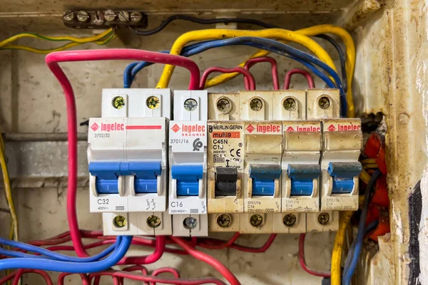 Close up of electrical panel with wiring and miniature circuit breaker