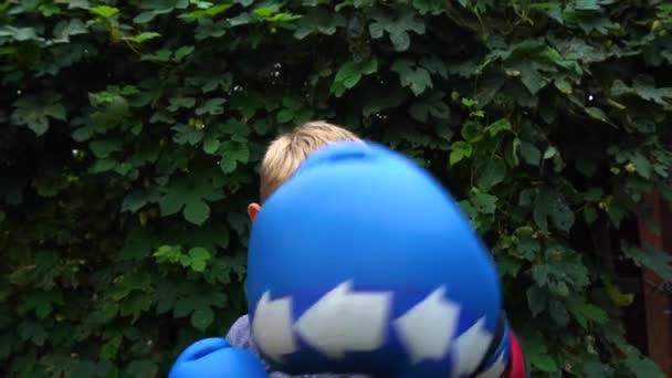 Boy Blue Gloves Boxing Kneading His Hands Yard — Stockvideo