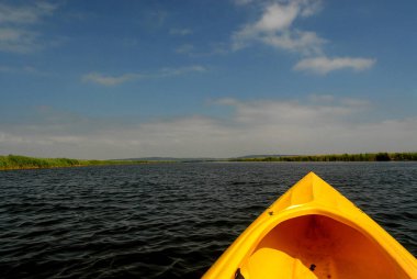 Yellow canoe on the lake on a sunny day, Poland