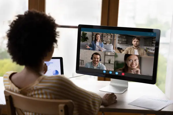 Focused young african american woman holding video conference conversation. — Stock Photo, Image