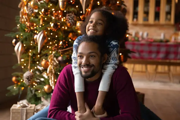 Happy biracial dad and little daughter have fun on Christmas — Stock Photo, Image