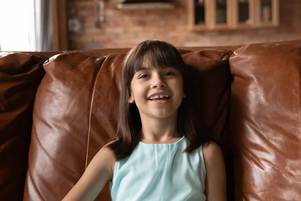 Happy kid speaking at web camera on video call — Stock Photo, Image