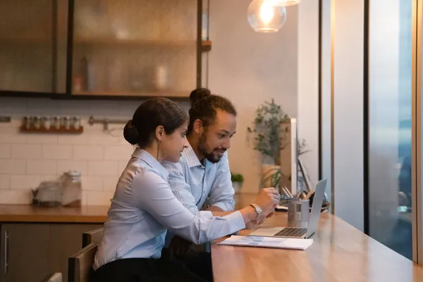 Concentrated mixed race employees working on computer. — Stock Photo, Image