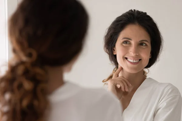 Beautiful woman admire face view looking in mirror — Stock Photo, Image