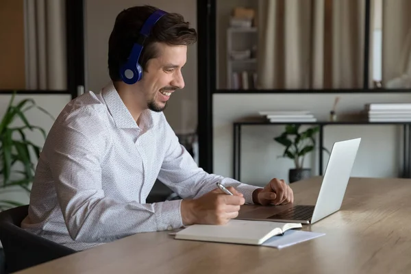 Happy young hispanic businessman hodling video call meeting. — Stock Photo, Image