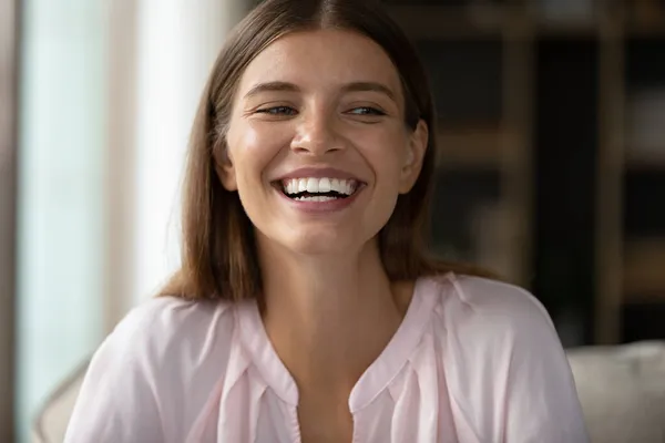 Happy young woman holding video call conversation. — Stock Photo, Image