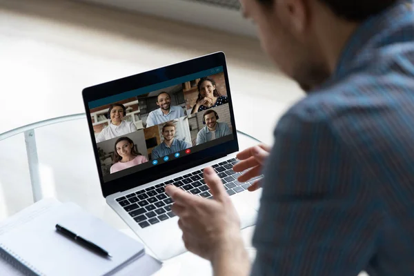 Concentrated young businessman holding video conference call. — Stock Photo, Image