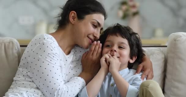 Cute little Indian boy trust secrets to beloved mother — Stock Video