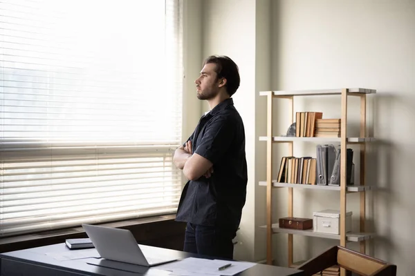 Serious thoughtful business man thinking over company future in office — Stock Photo, Image