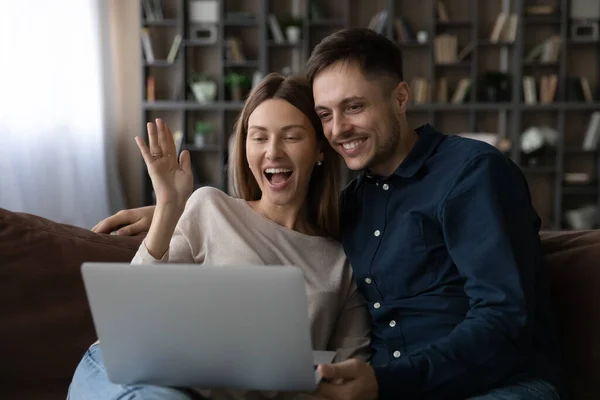 Happy young family couple holding video call meeting. — Stock Photo, Image