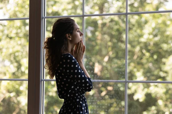 Frustrated unhappy anxious young hispanic woman looking in distance. — Stockfoto