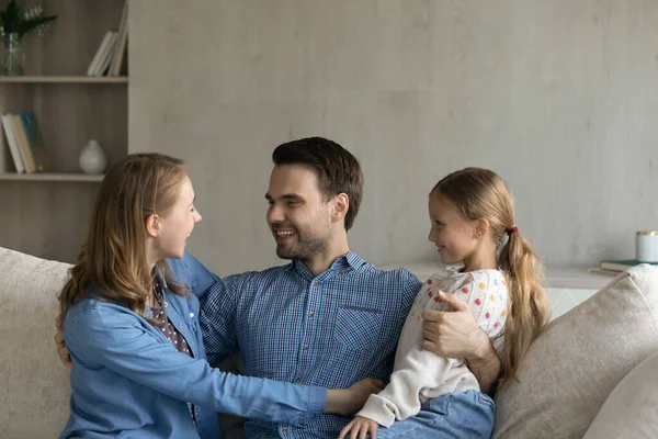 Happy family enjoying pleasant conversation at home. — ストック写真