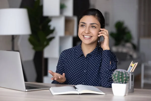 Happy Indian office worker talking on mobile phone — Stock Photo, Image