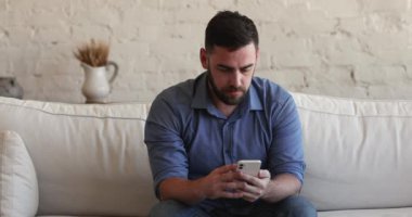 Winner man read message on cellphone feel overjoyed celebrate success