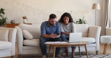 Young couple busy in family budget control and financial management