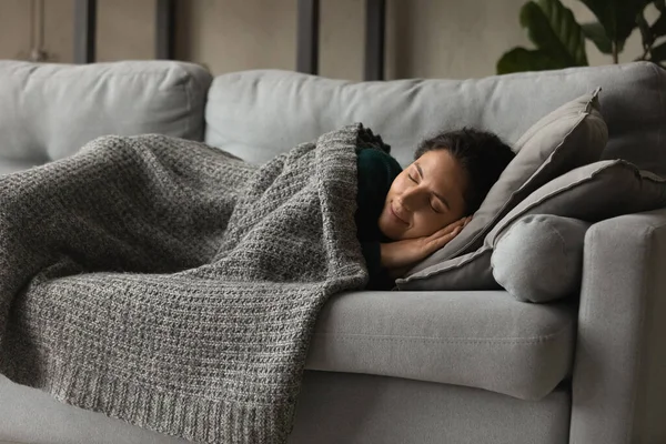 Happy mindful millennial sleeping under blanket at home. — Stok Foto