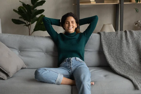 Happy young woman relaxing on weekend at home. — Stok fotoğraf