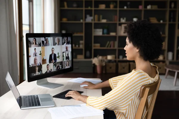 Concentrated millennial African American business woman holding video conference call. — Stock Photo, Image
