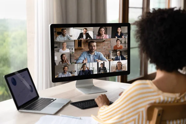 Focused young African American woman holding video conference call. — Fotografia de Stock