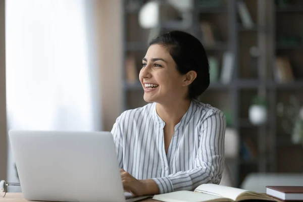 Happy millennial Indian woman working in modern office. — Stock Photo, Image