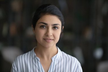 Portrait of happy confident Indian business woman.