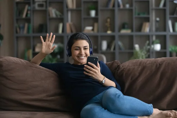 Happy young Indian woman holding distant video call meeting. — Fotografia de Stock