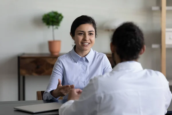 Happy young Indian woman talking with skilled doctor. — Foto de Stock