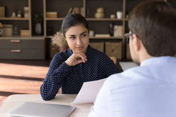 Interested young Indian hr manager holding job interview with candidate. — Stock Photo, Image