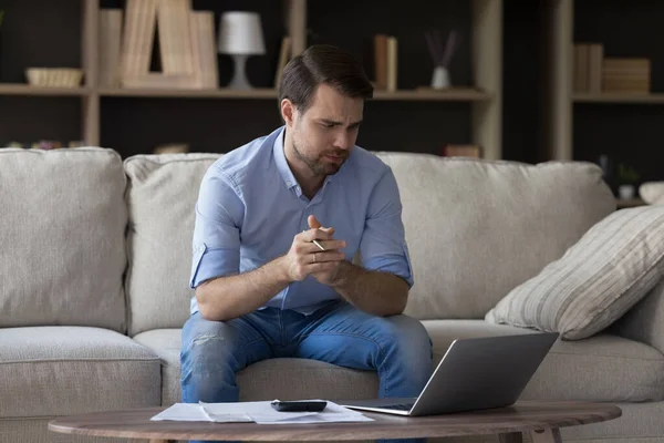 Frustrated unhappy young man having financial problems. — Stock Photo, Image