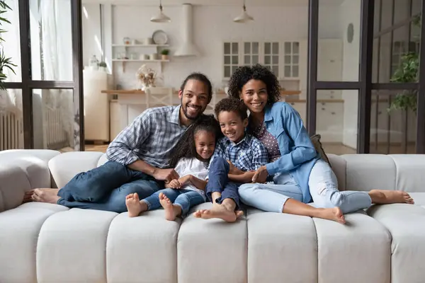 Full length portrait of smiling friendly African American family. — Stock Photo, Image
